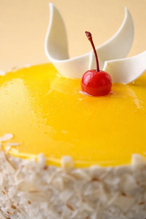 Mango Almond Mirror Glaze Cake